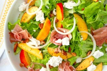 A bowl of Peach, Prosciutto and Goat Cheese Salad.