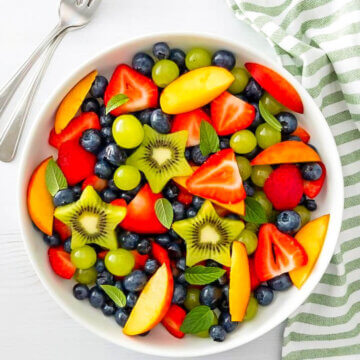 Summer Fruit Salad with kiwis, berries, peaches Fresh Mint