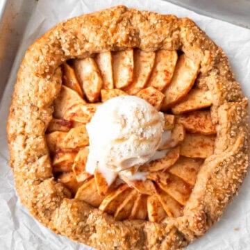 Apple Ginger Galette on a baking dish with a scoop of ice cream.