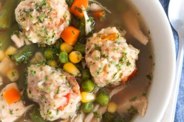 A bowl of Turkey Vegetable Soup with Stuffing Dumplings.