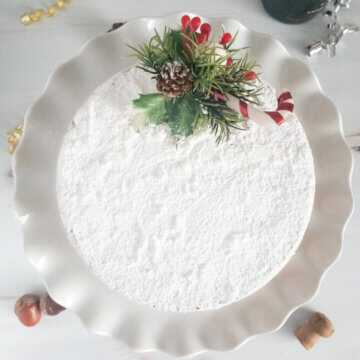 vasilopita greek new years cake topped with powdered sugar