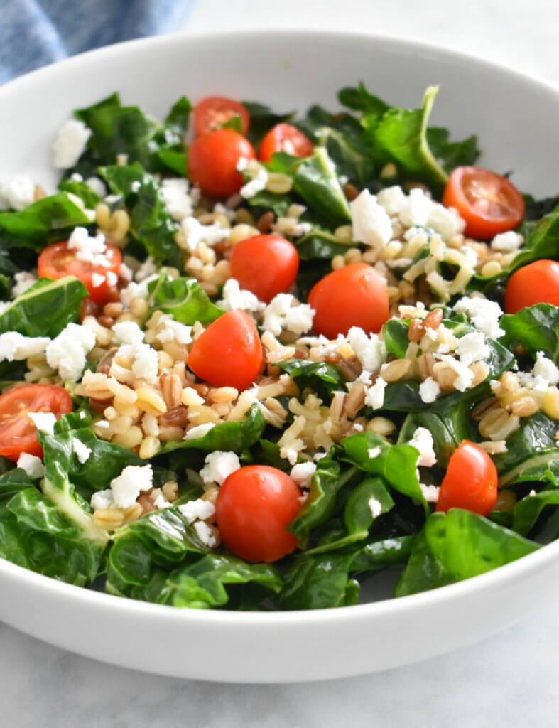bowl of swiss chard salad with ancient grains