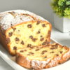 Sliced Chocolate Chip Ricotta Cake on a serving platter.