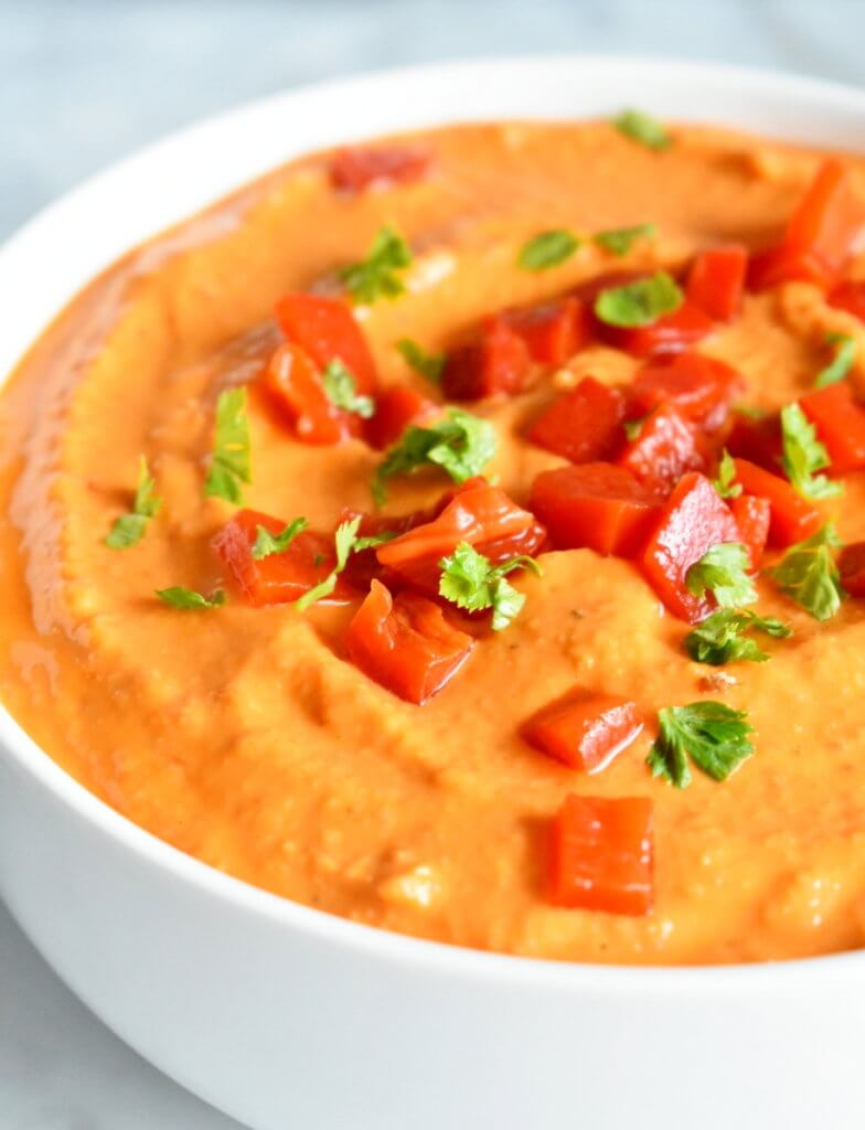 roasted red pepper hummus closeup.