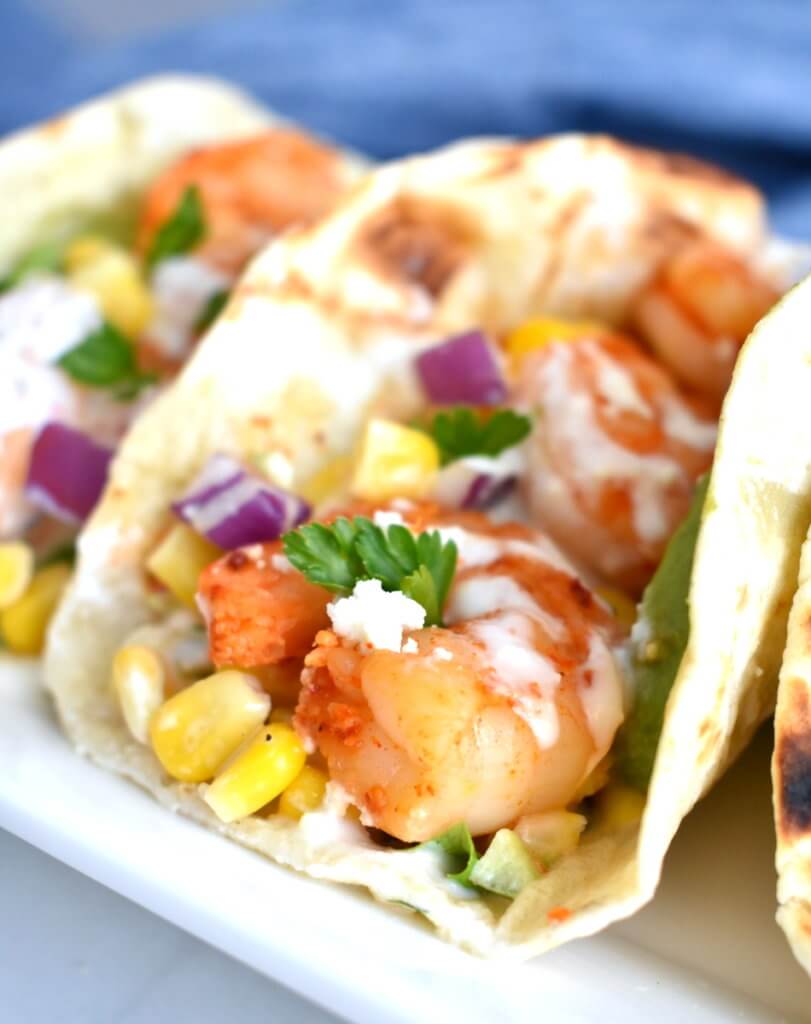 Closeup of a Chili Lime Shrimp Taco with Mexican Street Corn Salsa