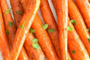 brown sugar glazed carrots sprinkled with fresh parsley