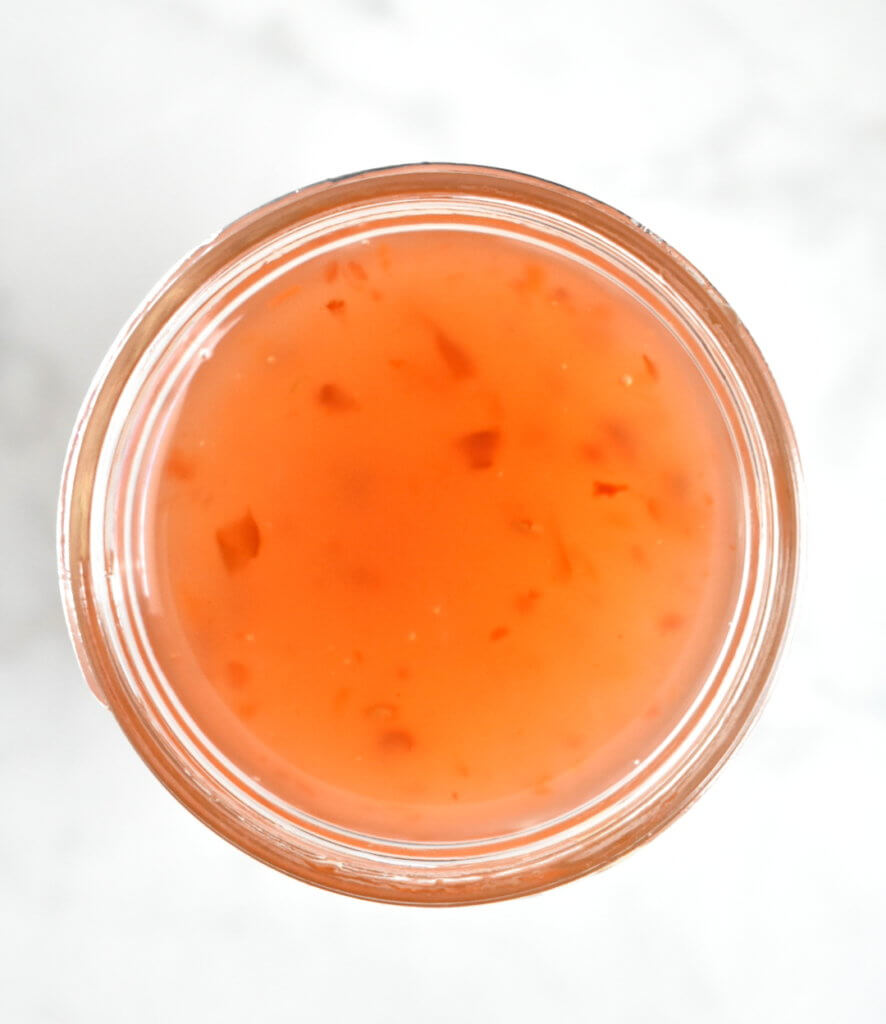 Topview of a jar of Sweet Chili Sauce.