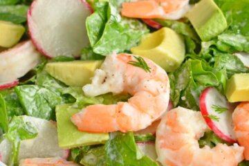 Closeup of a bowl of shrimp and avocado salad.