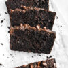 sliced chocolate zucchini bread on parchment paper