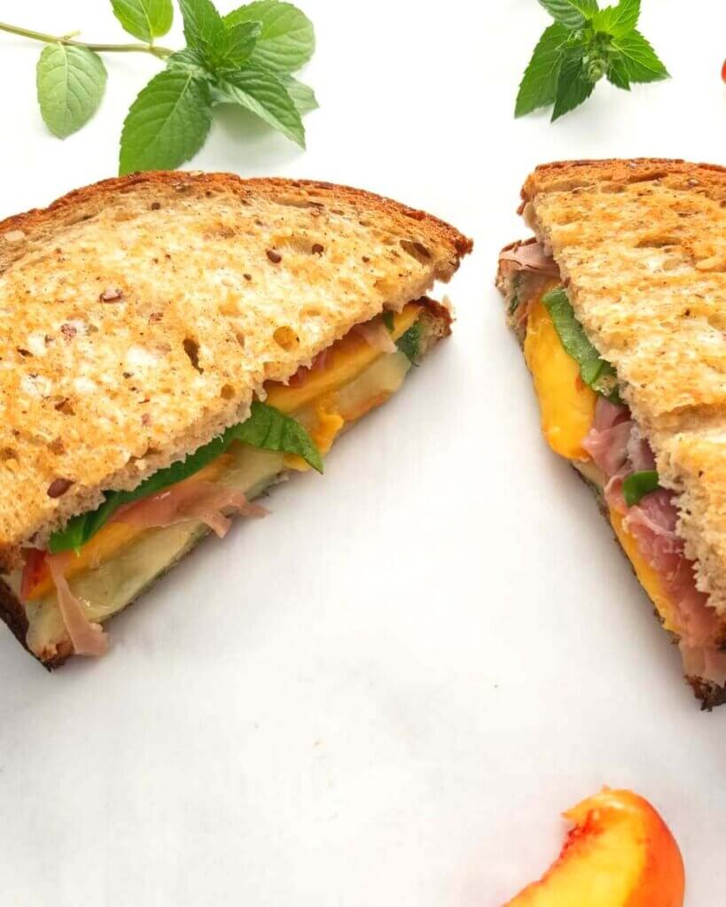 sliced Grilled Cheese with Peach, Spinach, Prosciutto and Mint Pesto