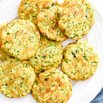 A plate full of zucchini fritters