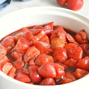 Bowl of balsamic roasted strawberries.