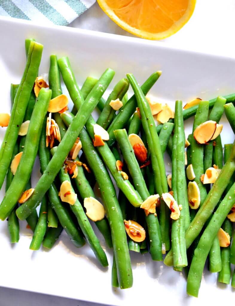 Green Beans topped with toasted almonds and lemon juice