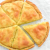 sliced prasopita or greek leek pie on parcment paper