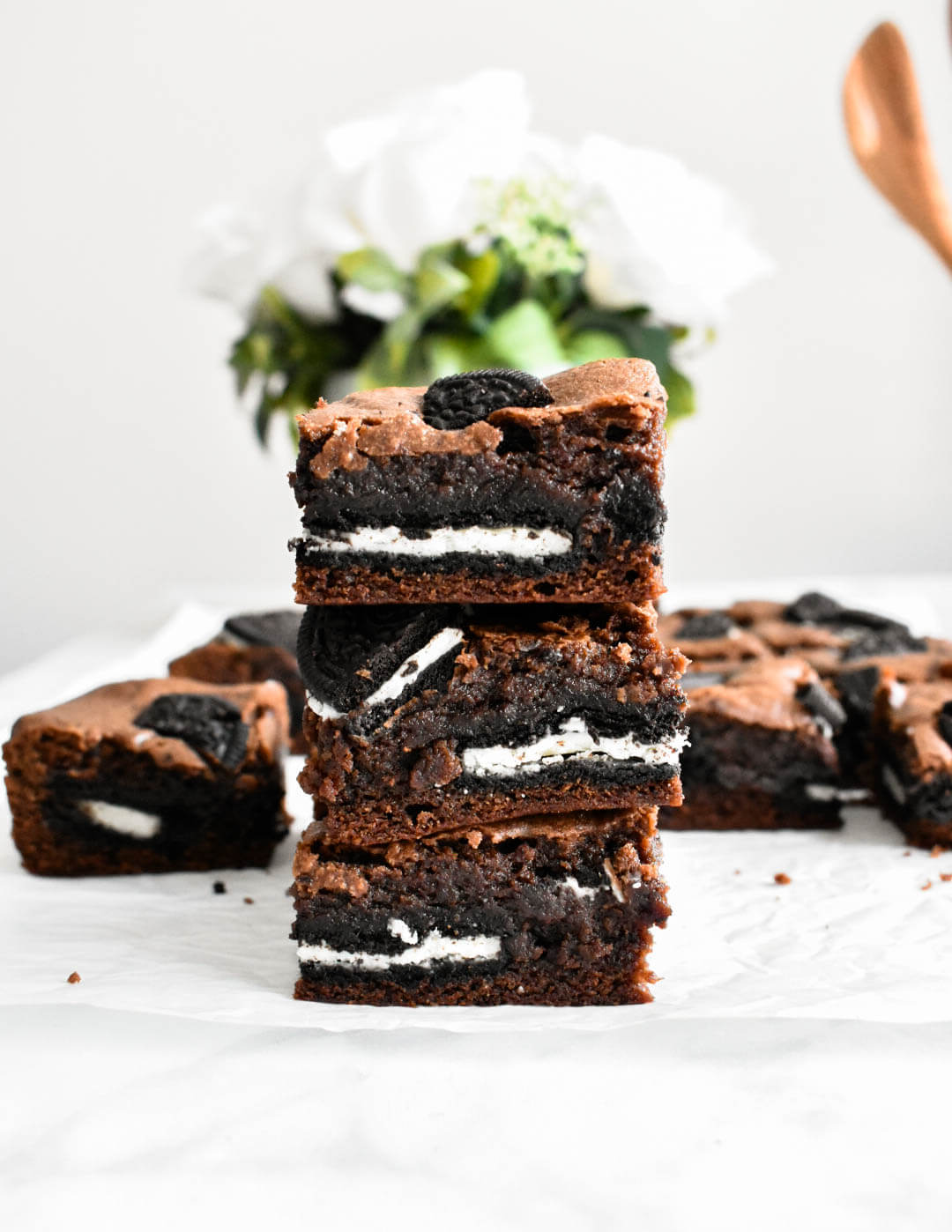 Three Oreo brownies stacked together.