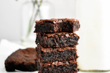 5 Homemade Fudgy Brownie slices stacked on top of each other.