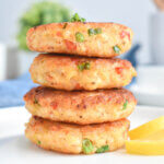 easy shrimp cakes stacked on a plate