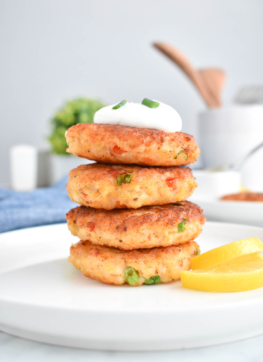 Stack of Easy Shrimp Cakes topped with sour cream
