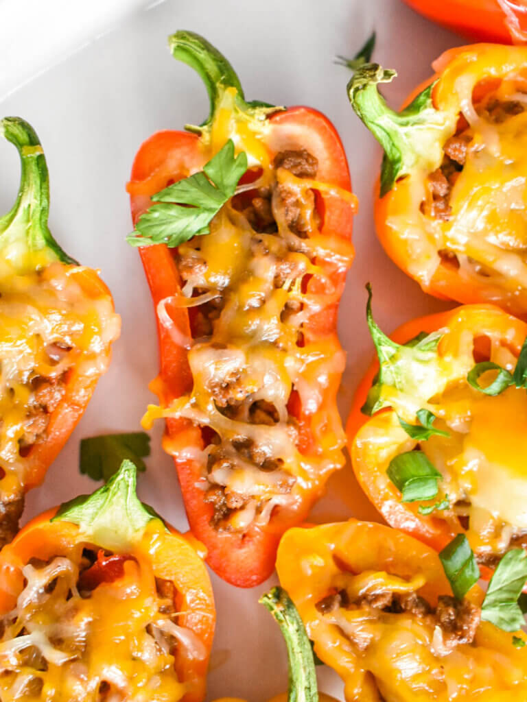 Taco Stuffed Mini Peppers topped with melty cheese