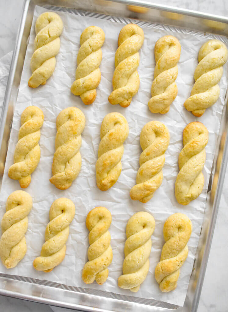 Koulourakia - Greek Easter Cookies on a baking sheet.