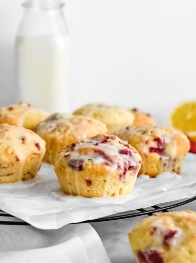 Lemon Raspberry Muffin dripping with icing glaze