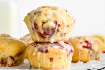 raspberry lemon muffins recipe drizzled with icing