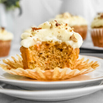 carrot cake cupcakes bite shot showing fluffy texture.