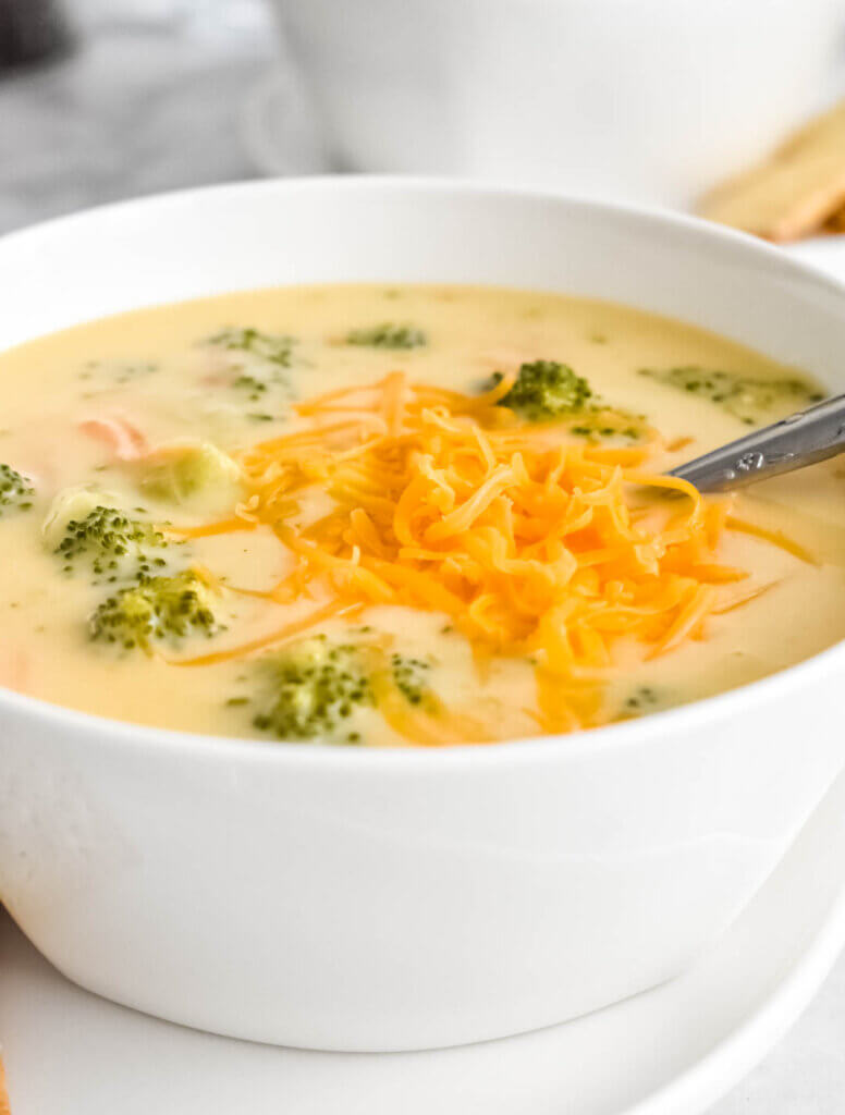 Broccoli Cheddar Soup topped with shredded cheese