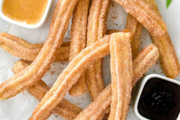 Platter of Churros with caramel and chocolate dipping sauce