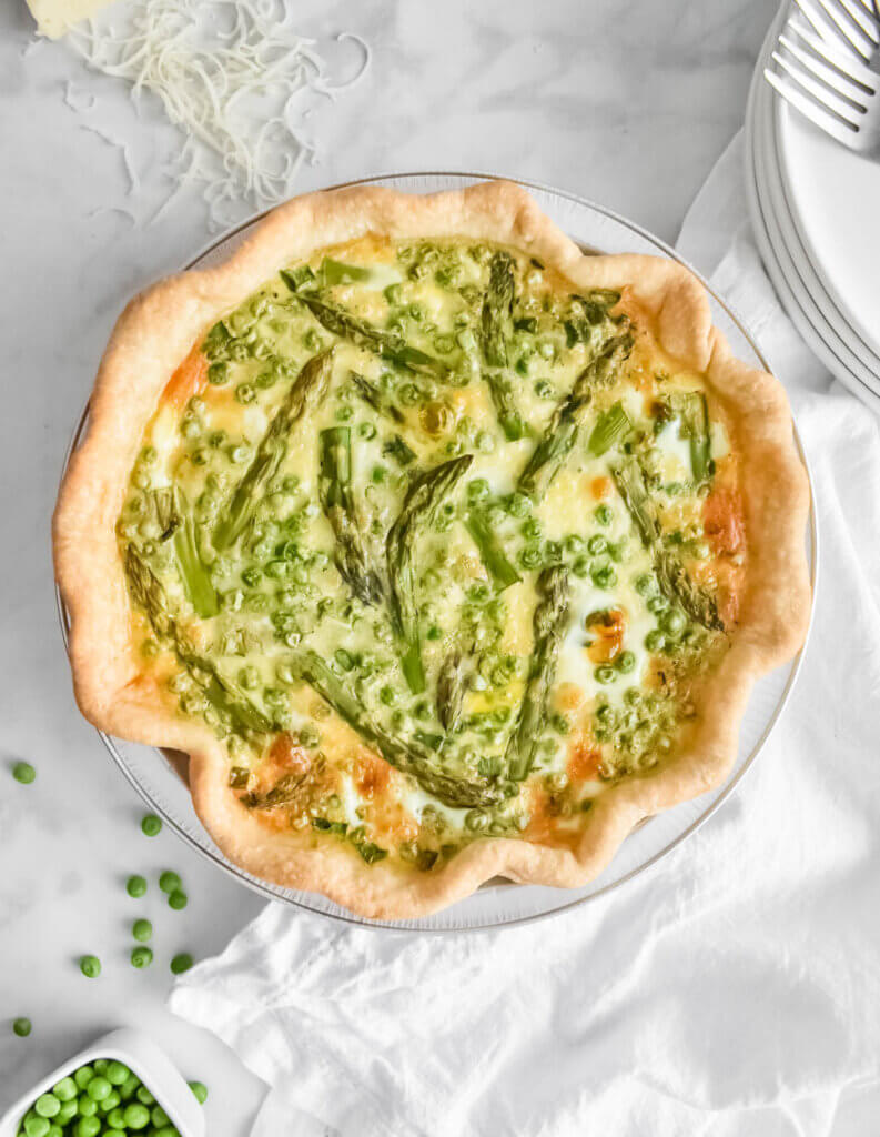 Asparagus and Pea Quiche on a breakfast table.