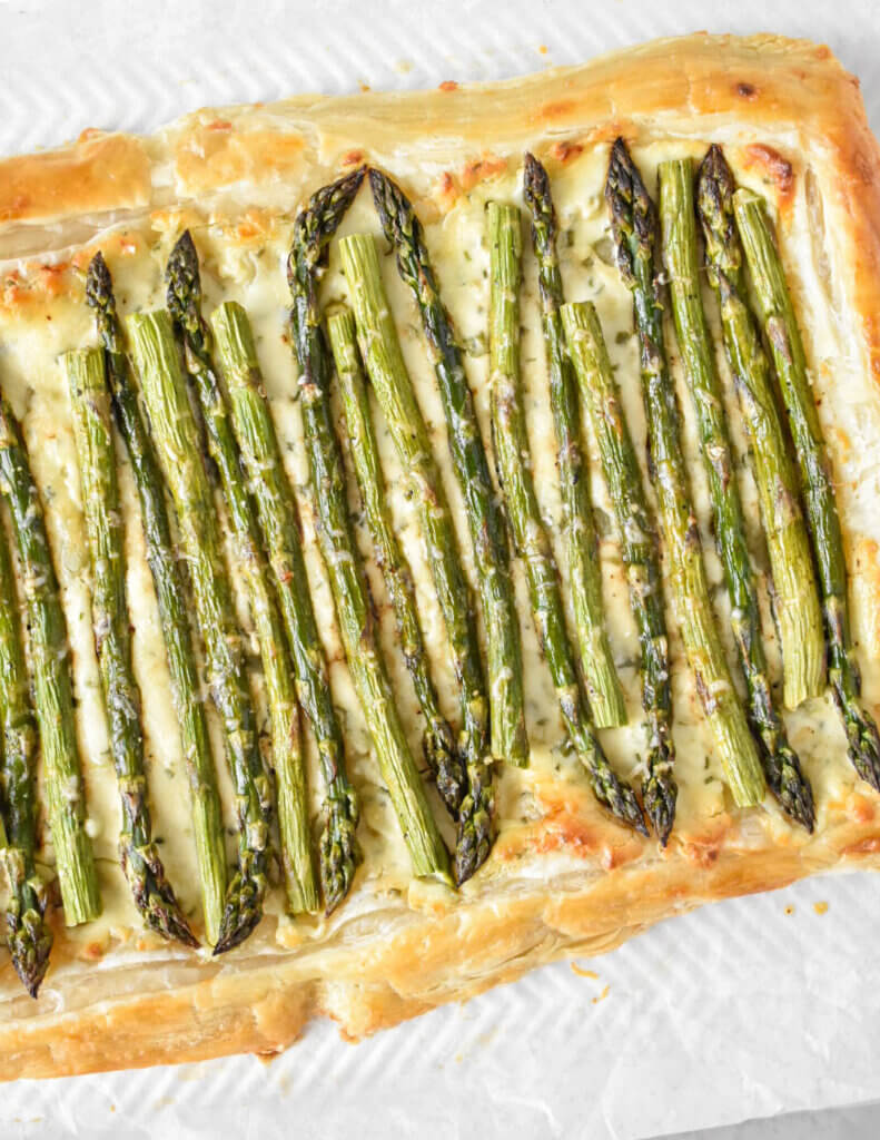 Asparagus Puff Pastry Tart on parchment paper