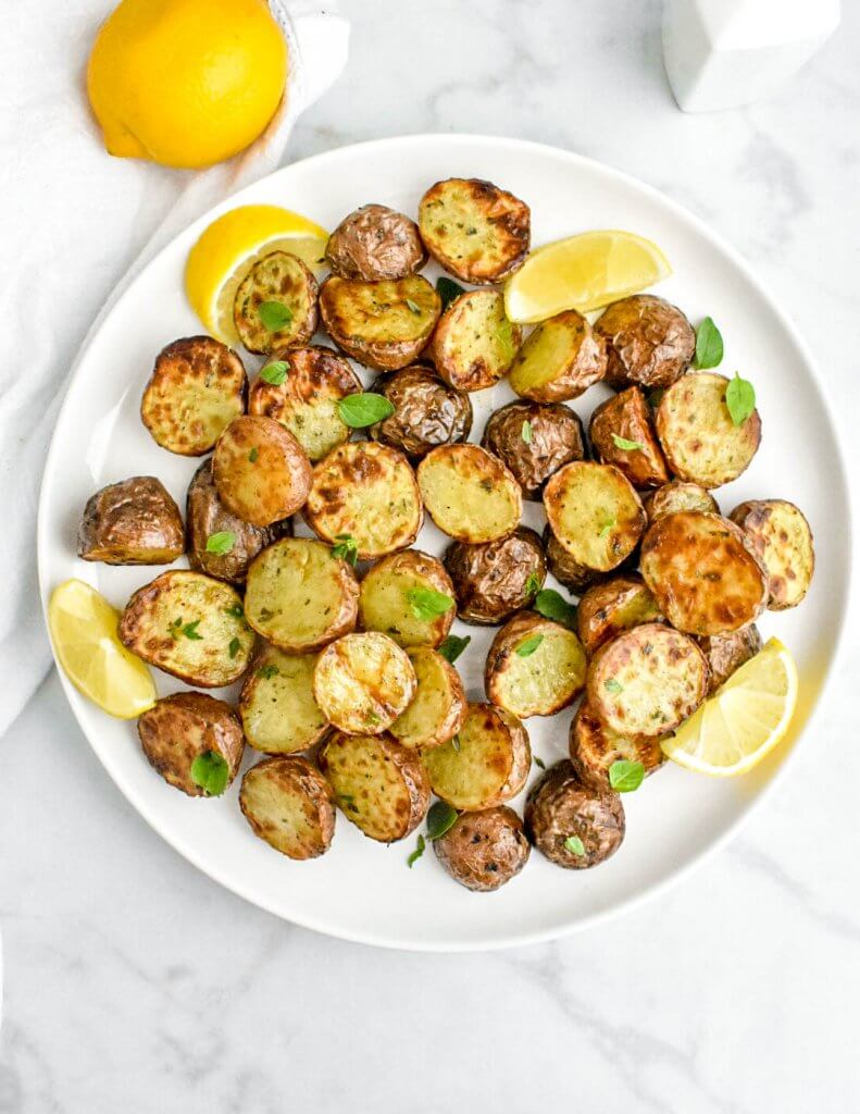 crispy air fryer potatoes on a white platter