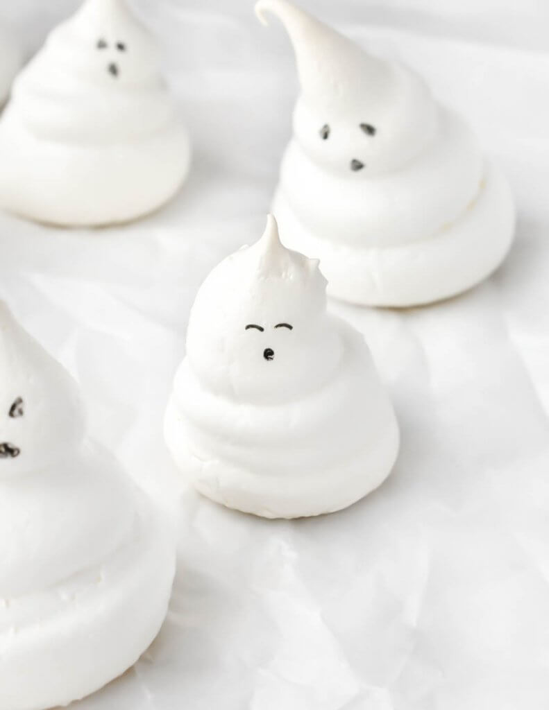 Meringue ghost with a surprised facial expression