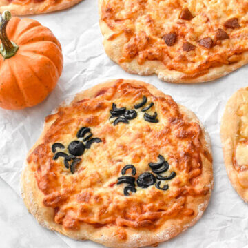 Halloween Pizzas with spider pizza design and jack o' lantern pizza design
