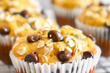 Banana Chocolate Chip Oat Muffin topped with oat flakes