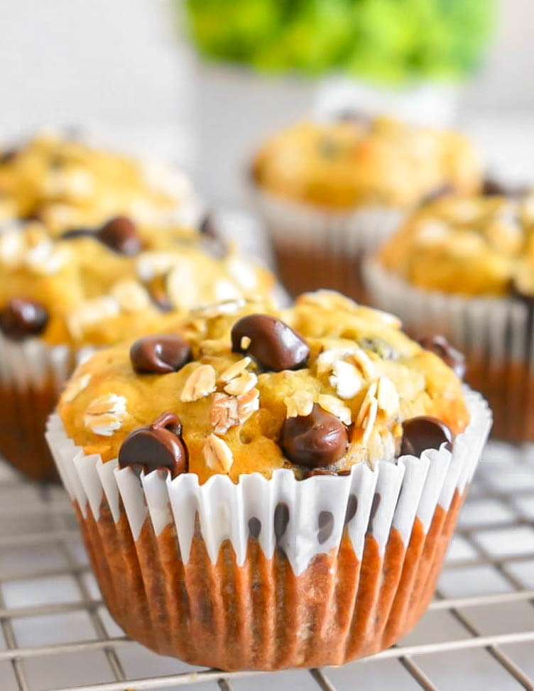 Banana Chocolate Chip Oat Muffin topped with oat flakes