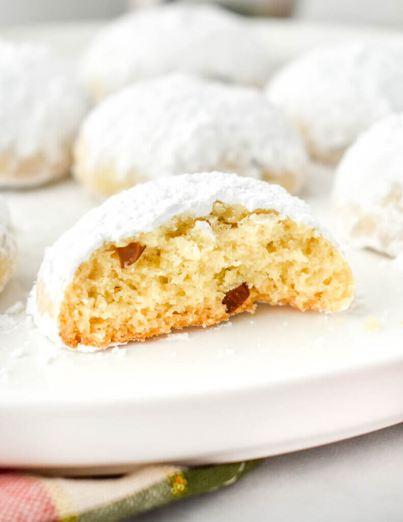 Close up bite shot of a Kourabiedes cookie