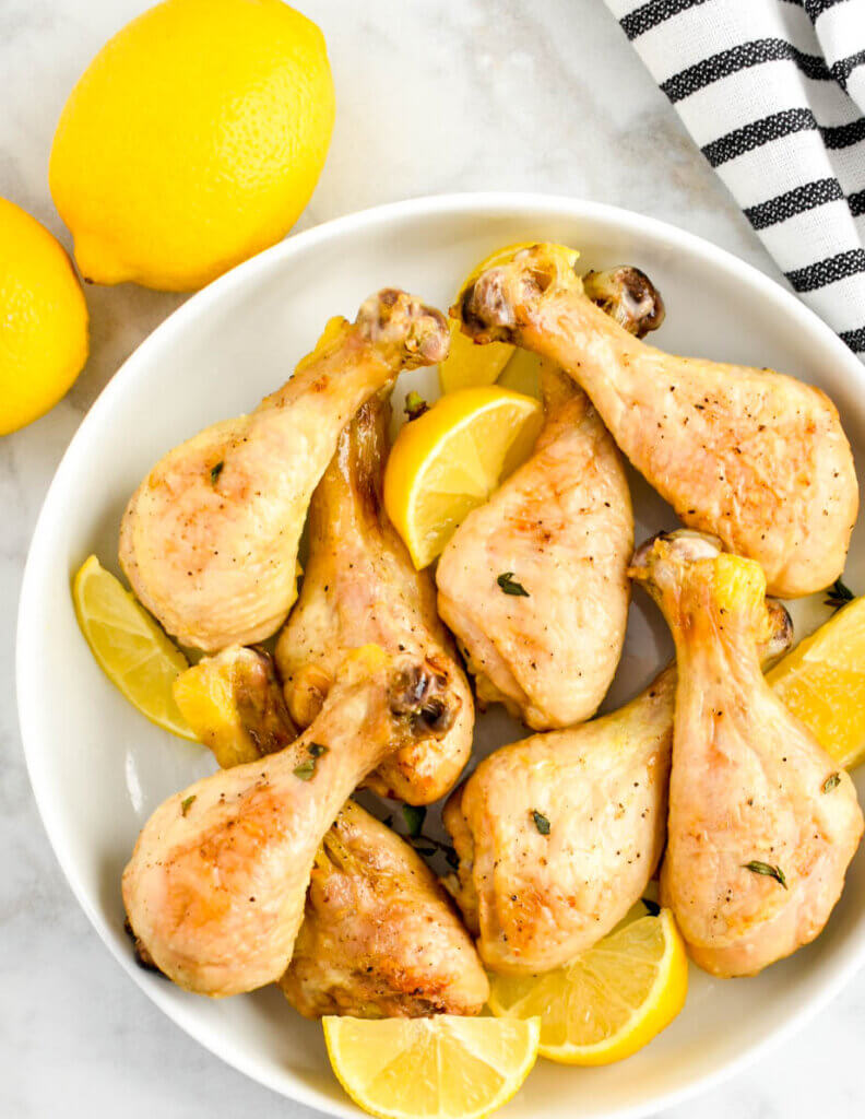 Closeup of a plate of Oven Roasted Lemon Chicken Drumsticks