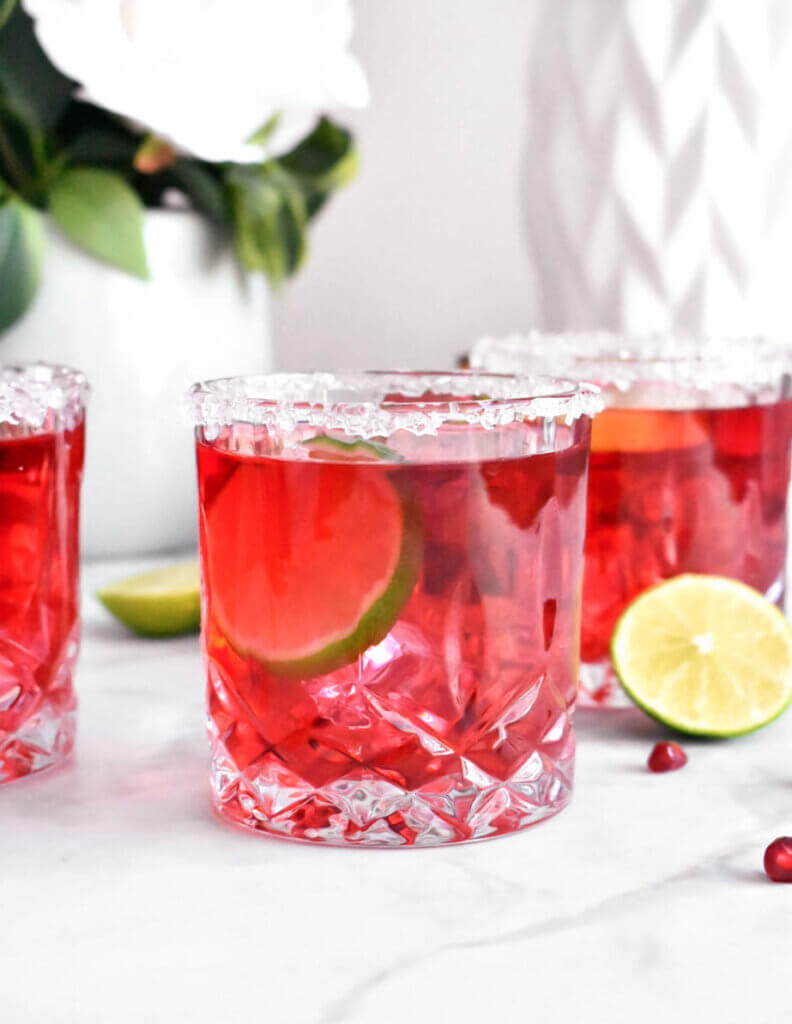 glasses of Pomegranate Margarita with a sugar rim