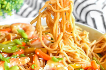 Chopstick full of Shrimp Ramen Stir Fry noodles
