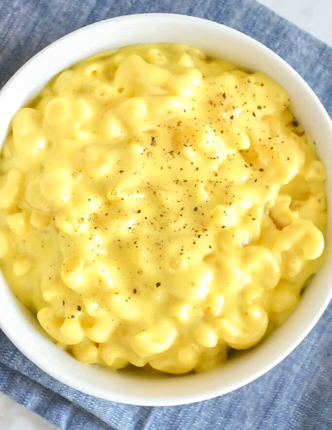 A bowl of creamy macaroni and cheese made in the slowcooker