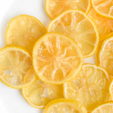 Candied Lemon Slices on a white plate.