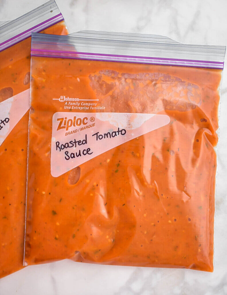 Roasted tomato sauce in ziploc bags.