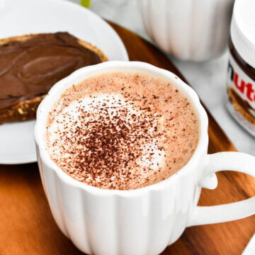 A Nutella Latte dusted with cocoa powder.