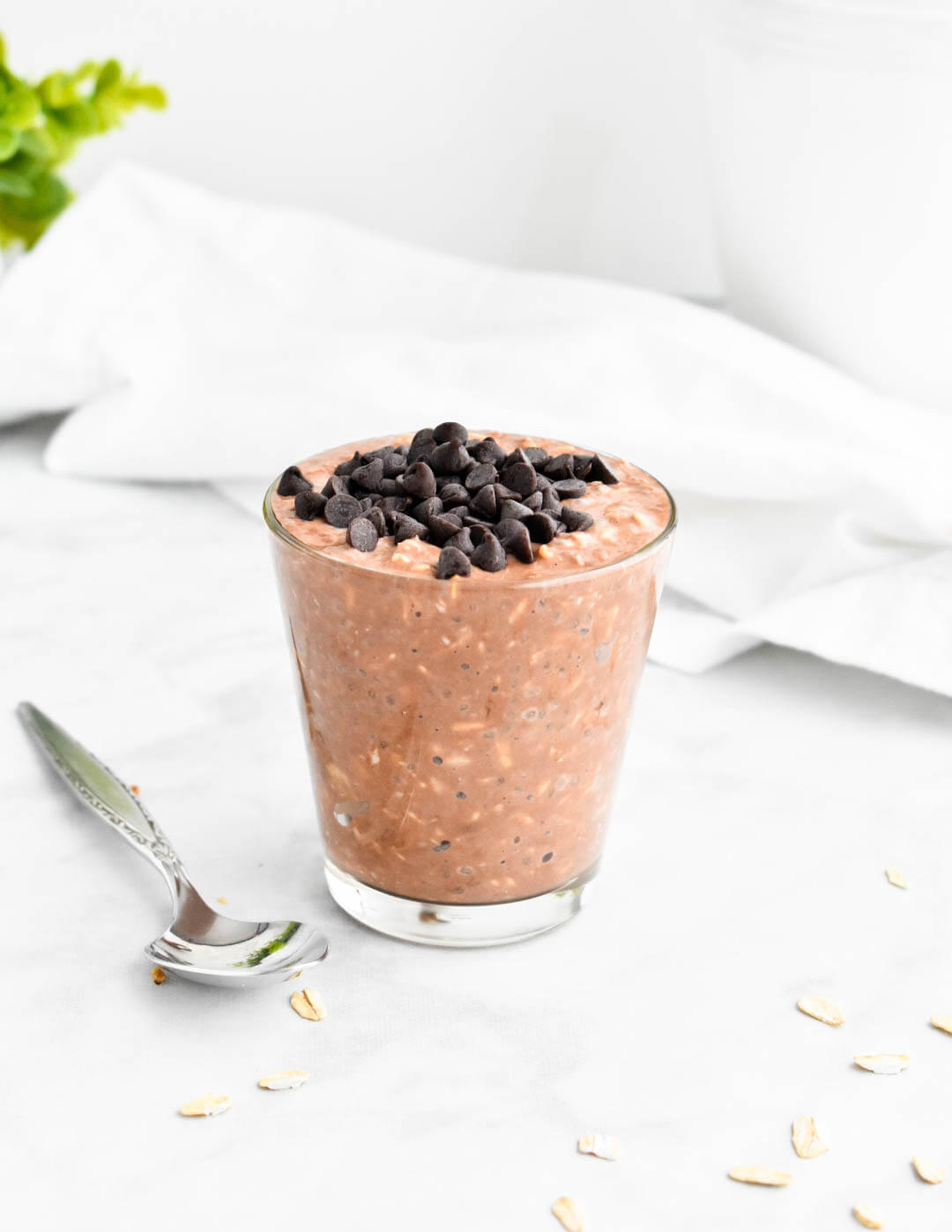 Chocolate overnight oats topped with mini chocolate chips.