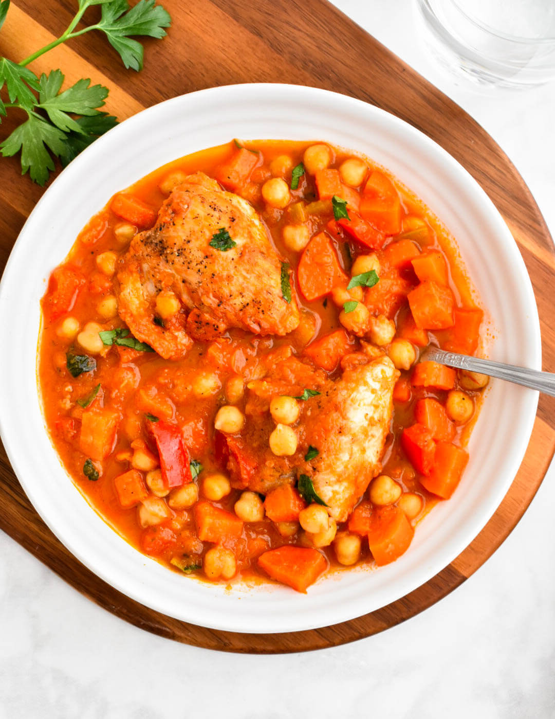 A bowl of Greek chicken and chickpea stew.